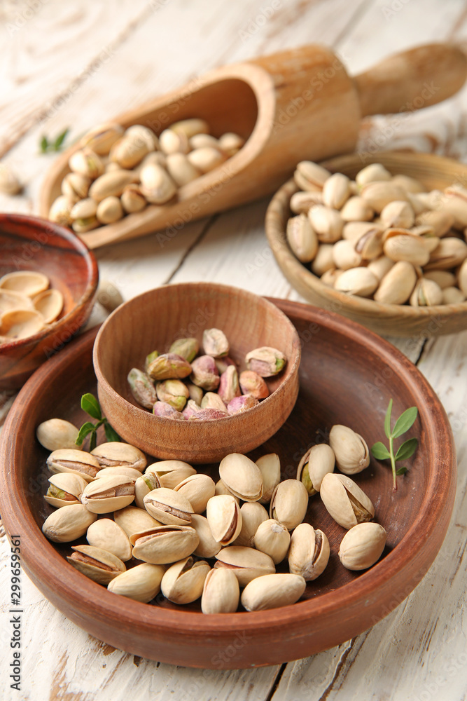 Tasty pistachio nuts on table