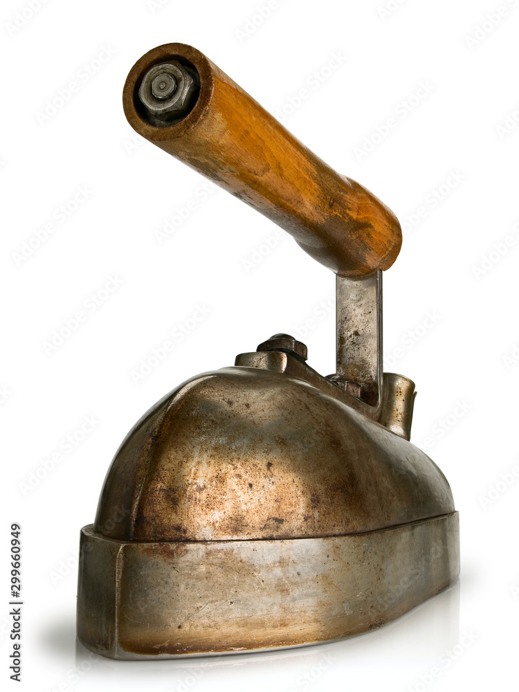 Fototapeta premium The ancient electric iron with the wooden handle