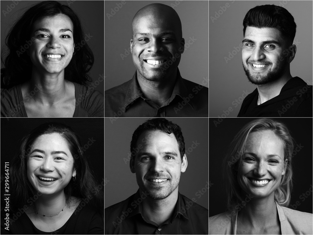 Group of young multicultural people in front of a black background Group of young multicultural people in front of a black background
