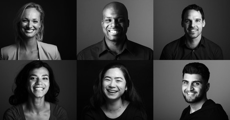 Group of young multicultural people in front of a black background
