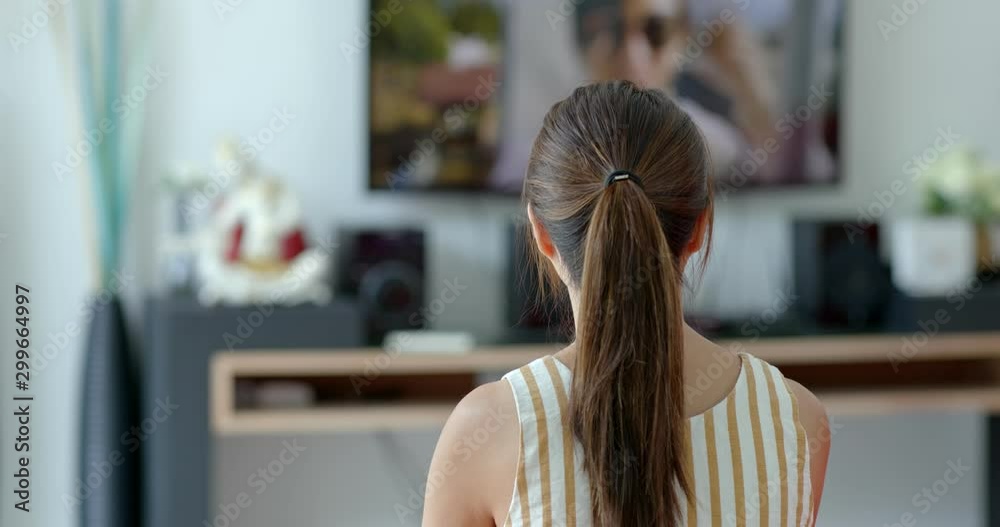 Woman watch tv at home