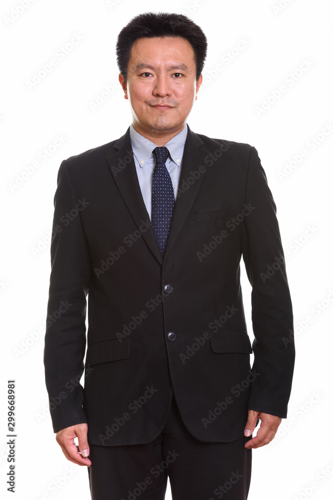 Studio shot of Japanese man isolated against white background Studio shot of Japanese man isolated against white background