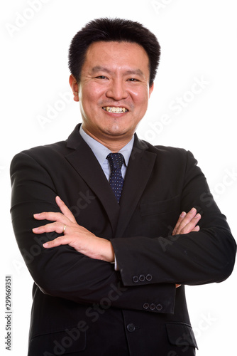 Studio shot of Japanese man isolated against white background