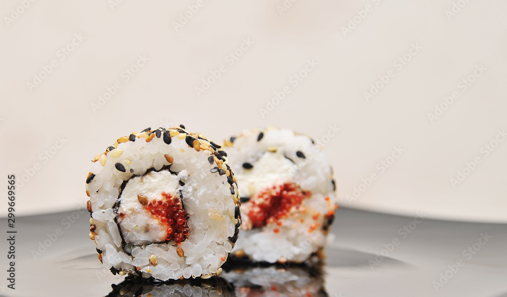 Japanese rolls on stone background. Japanese rolls on stone background.
