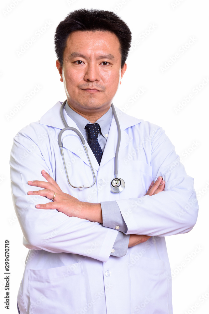 Studio shot of Japanese man isolated against white background Studio shot of Japanese man isolated against white background
