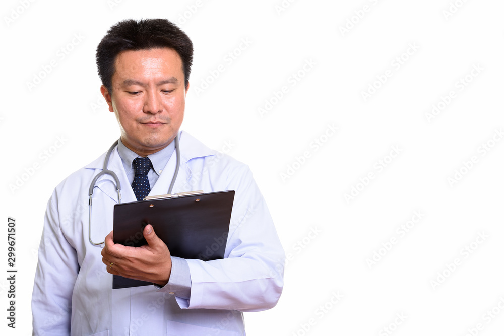 Studio shot of Japanese man isolated against white background Studio shot of Japanese man isolated against white background