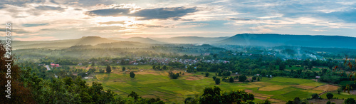 Panorama view small city in phu pan mountain against clouds sky,sakon nakhon province,thailand