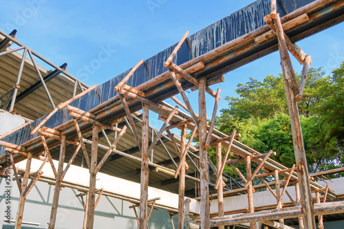 Bamboo prop beam, house under construction