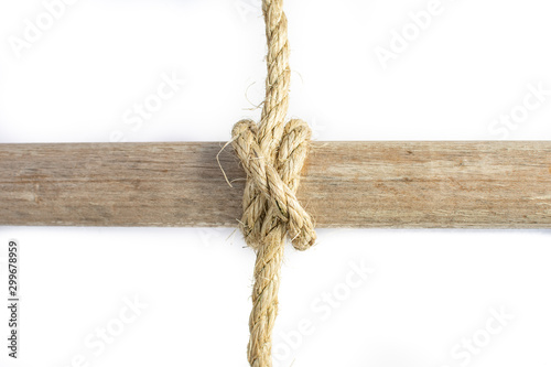 Billede på lærred Clove Hitch around a wooden Spar in natural Sisal Rope.