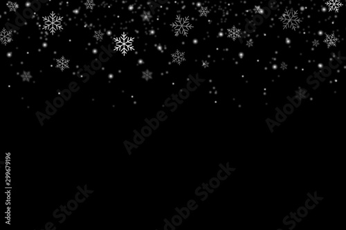 Snowflakes falling for christmas decoration abstract black background.