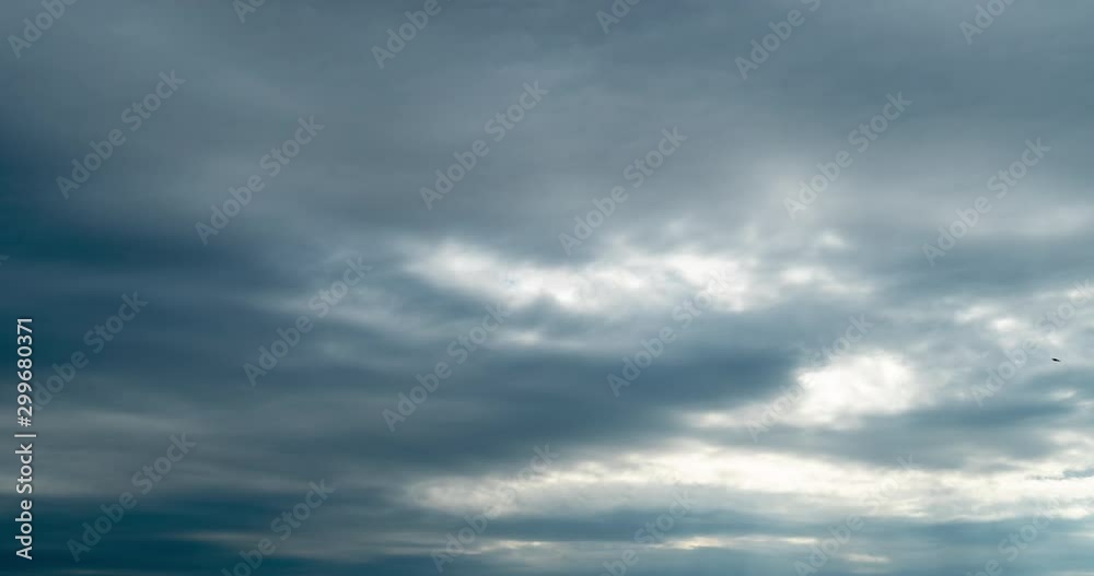 timelapse of stratus clouds with sun light leak out timelapse of stratus clouds with sun light leak out