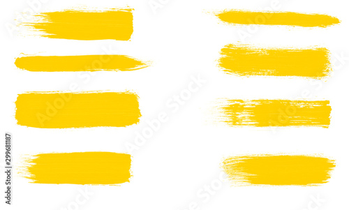 Set of yellow isolated stroke brush