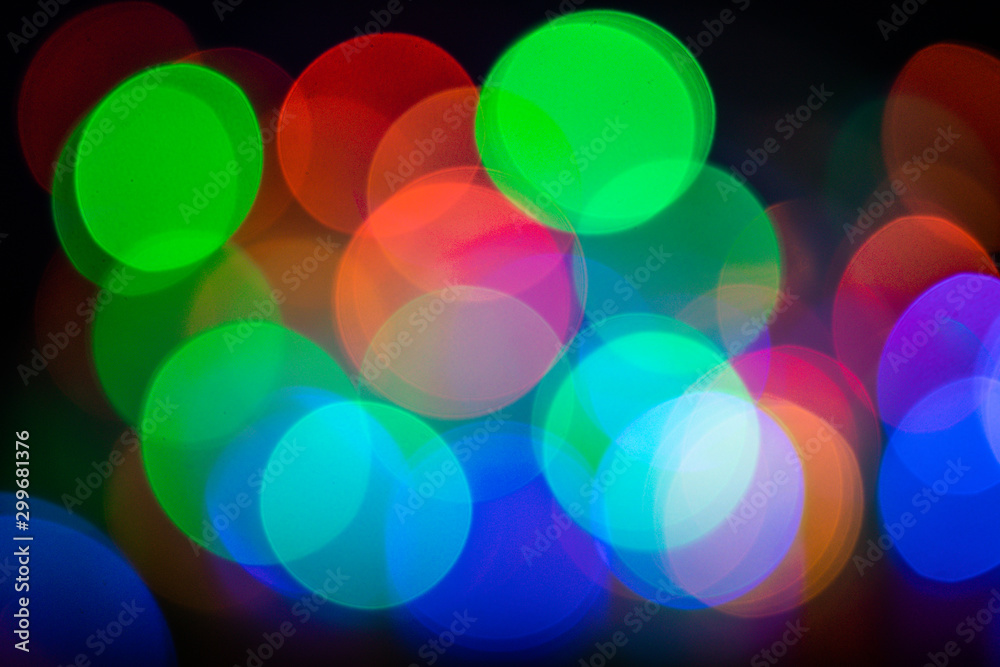 Colorful abstract bokeh lights  background.Abstract blurred bokeh Christmas or New Year lights in background.
