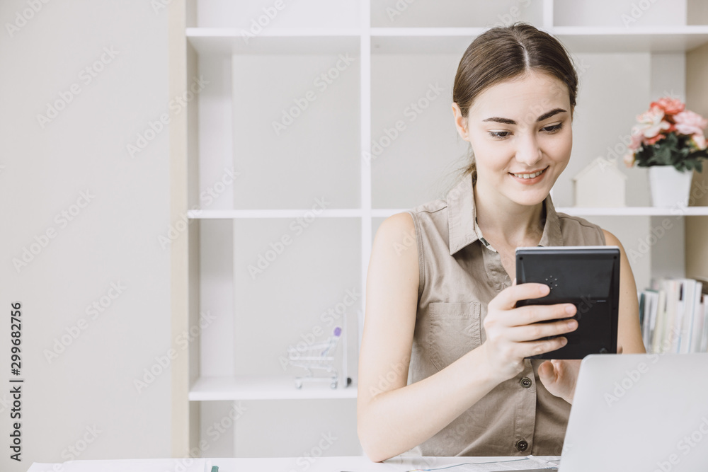 Business office girl using calculator with space for text. Business office girl using calculator with space for text.