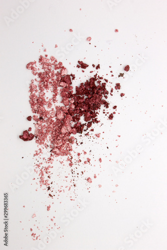 This is a photograph of Metallic Pink and Burgundy Powder Eyeshadow isolated on a White Background