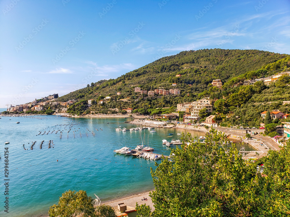 Beautiful Ligurian coast of Italy. View of a part of the bay of poets near the small town of Portovenere and the island of Palmaria.