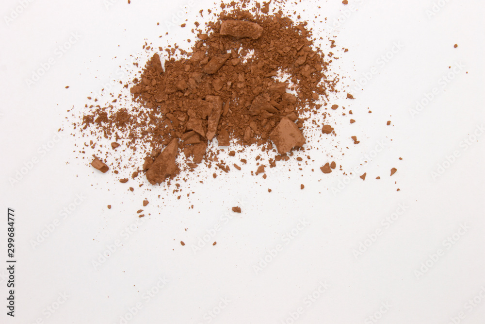 This is a photograph of a Matte Brown Powder Eyeshadow isolated on a White Background This is a photograph of a Matte Brown Powder Eyeshadow isolated on a White Background