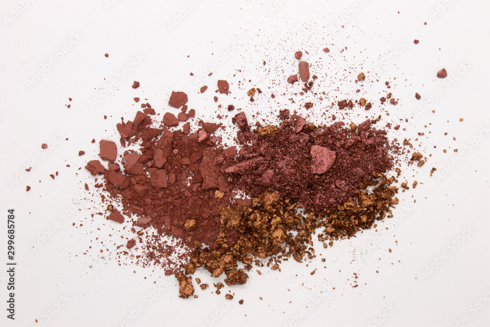 This is a photograph of a Burgundy,Metallic Bronze,and Burnt Umber Powder Eyeshadow isolated on a White Background This is a photograph of a Burgundy,Metallic Bronze,and Burnt Umber Powder Eyeshadow isolated on a White Background