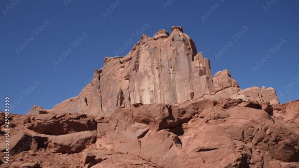 SANDSTONE MOUNTAIN. Natural Rock Formation in Moab, Utah. You could see hundreds of these monstrous formations along the road as you Drive. SANDSTONE MOUNTAIN. Natural Rock Formation in Moab, Utah. You could see hundreds of these monstrous formations along the road as you Drive.