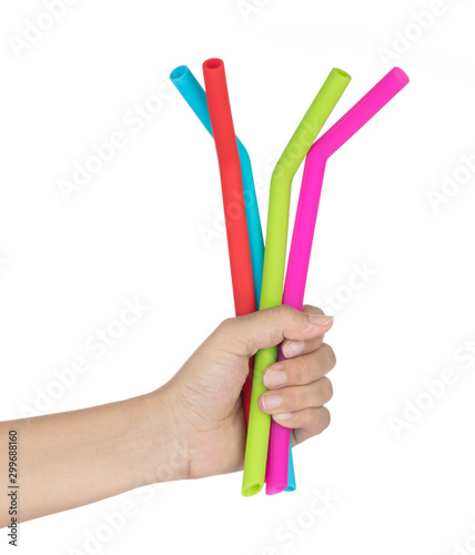 Photos hand holding straw silicone isolated on white background