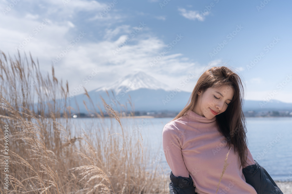 Tourist woman at Kawaguchiko lake in Japan. Tourist woman at Kawaguchiko lake in Japan.