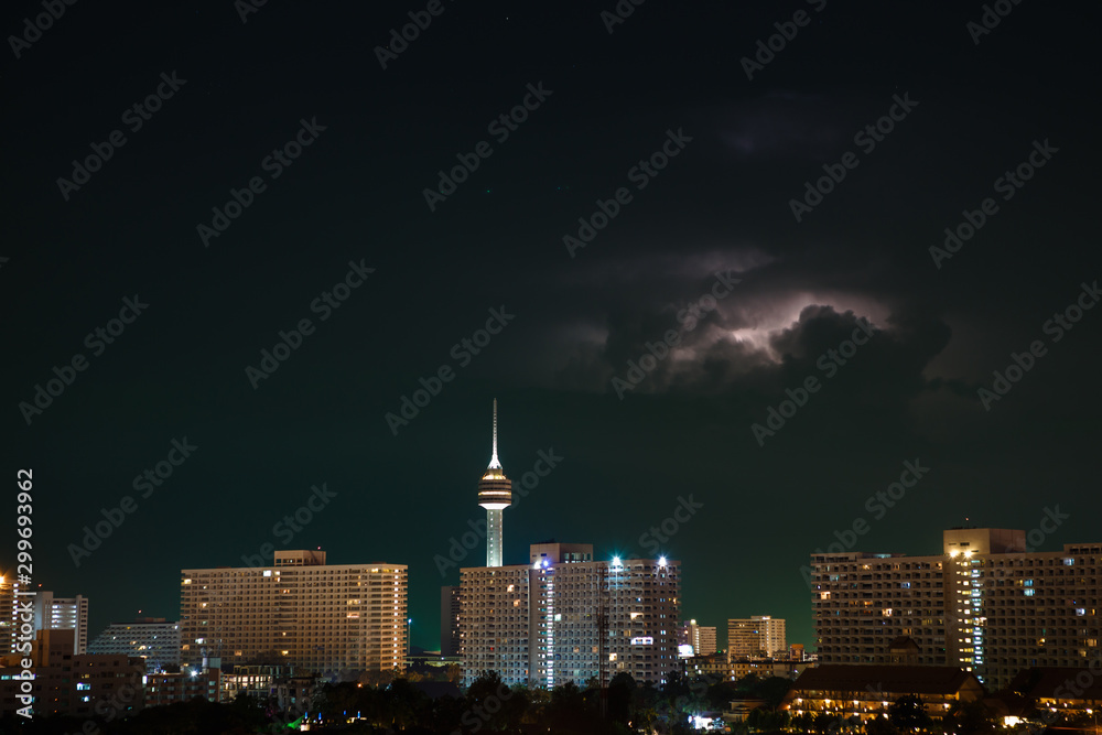 Fototapeta premium Night city, thunderstorm, lightning. Pattaya