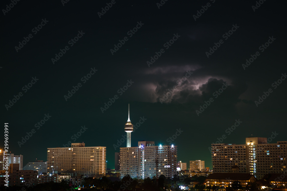 Fototapeta premium Night city, thunderstorm, lightning. Pattaya