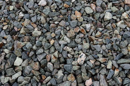 Black small road stone background, dark gravel pebbles stone texture, granite,marble