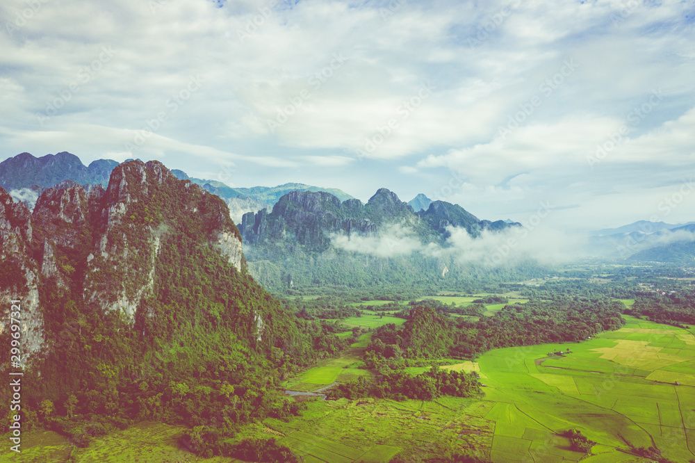 Fototapeta premium Aerial view of beautiful landscapes at Vang Vieng , Laos. Southeast Asia. Photo made by drone from above. Bird eye view.