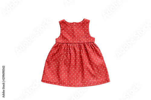 Pink girls dress with white polka dots design isolated on white background