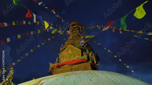Swayambhu temple at night, ancient religious architecture atop a hill in the Kathmandu Valley, west of Kathmandu city photo