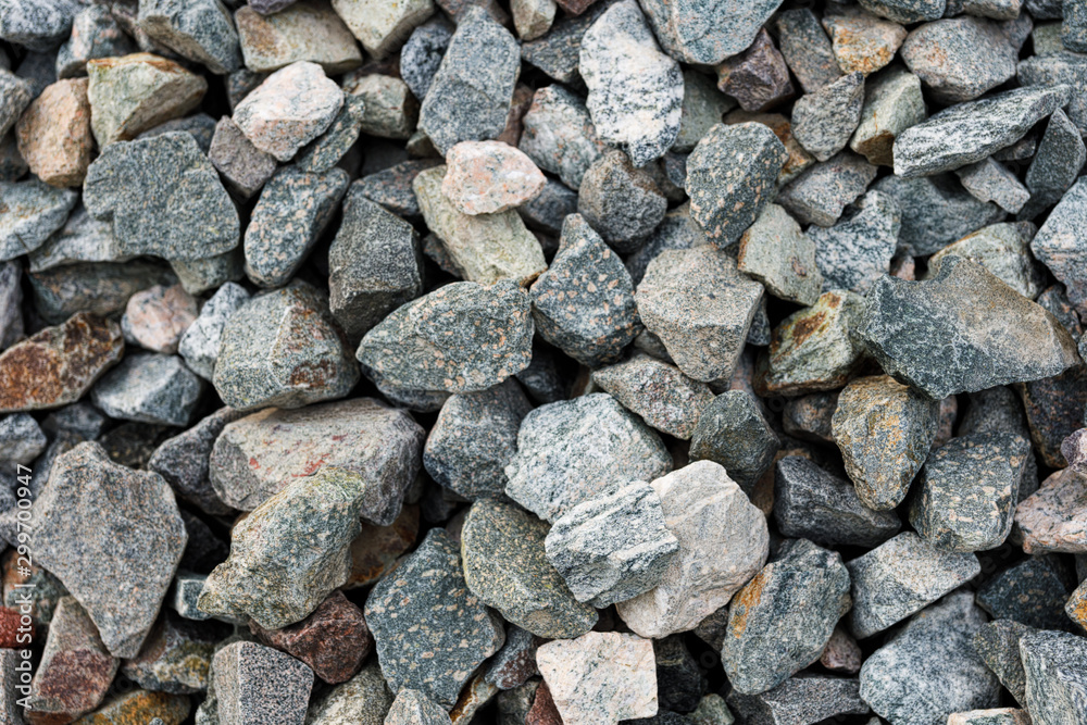 Small road stone background, gravel pebbles stone texture, granite,marble