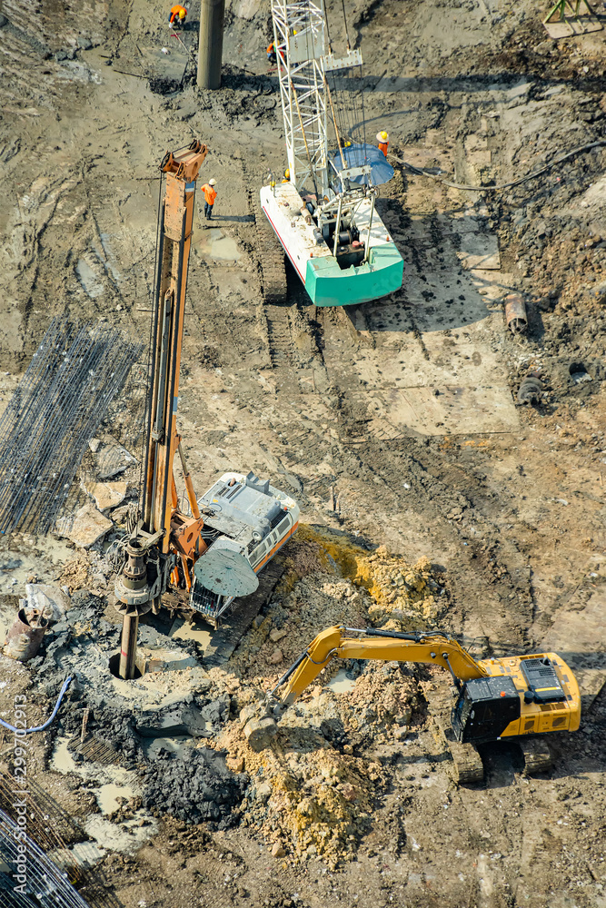 Aerial view of concrete bored pile foundation work on a construction site. Aerial view of concrete bored pile foundation work on a construction site.
