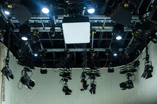  Professional Television Studio Equipment. Full Studio Lighting Rig, Teleprompter and Cables. Recording Show in TV Studio. – Image photo