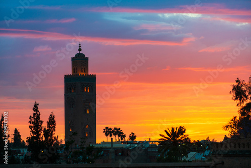 Fototapeta Naklejka Na Ścianę i Meble -  Sunset Silhouettes Koutoubia Mosque, Marrakesh, Morocco