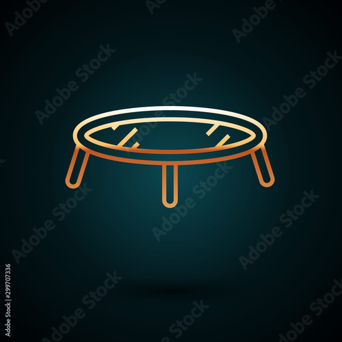 Gold line Jumping trampoline icon isolated on dark blue background. Vector Illustration
