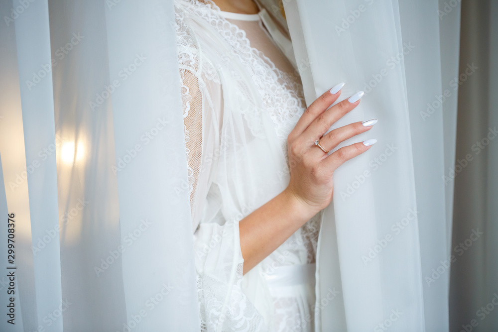 Beautiful bride in a white coat on a wedding day Beautiful bride in a white coat on a wedding day