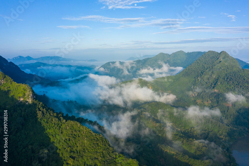 Aerial view of mountains in Nong Khiaw. North Laos. Southeast Asia. Photo made by drone from above. Bird eye view.