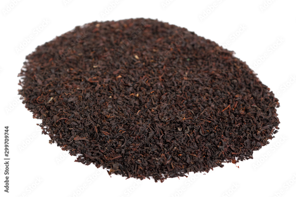 Loose dried black tea leaves. Isolated on white background. Loose dried black tea leaves. Isolated on white background.