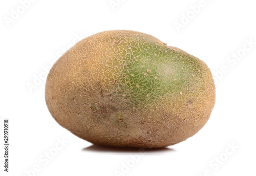 Raw unpeeled potato with green skin. Isolated on a white backgro
