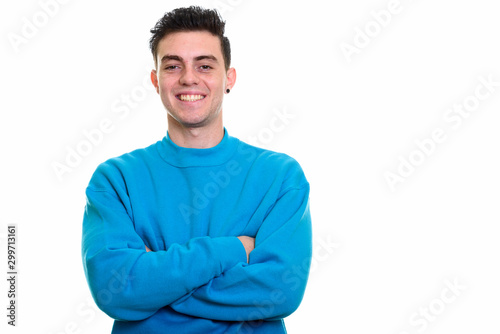 Studio shot of young handsome man isolated against white background