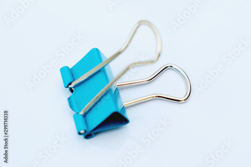 BLUE paper clip isolated on white background