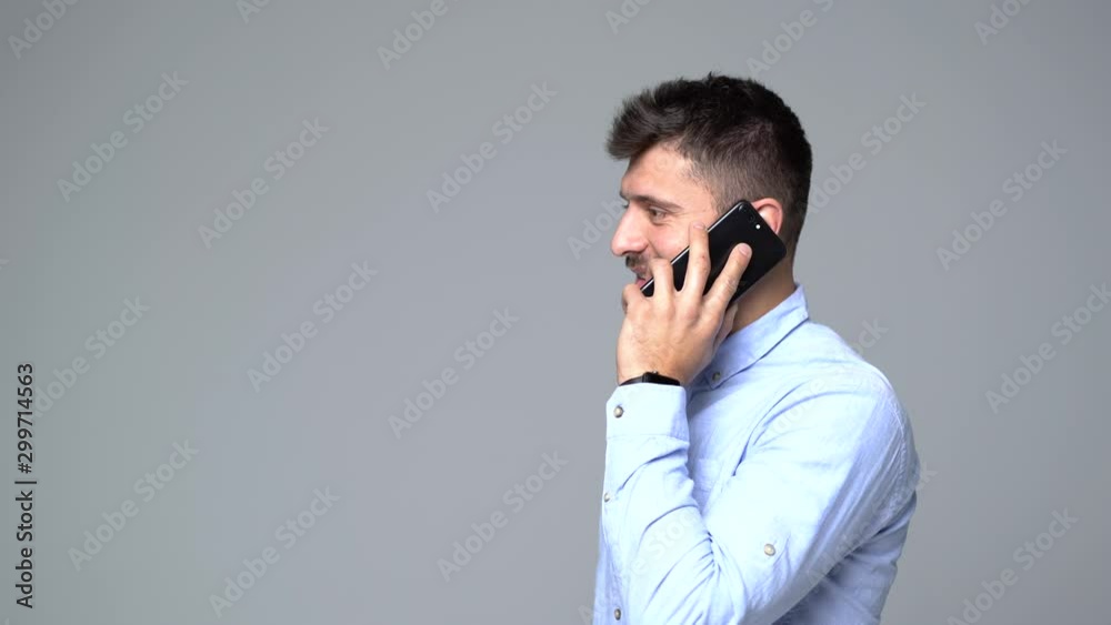 Young man talking phone isolated Young man talking phone isolated