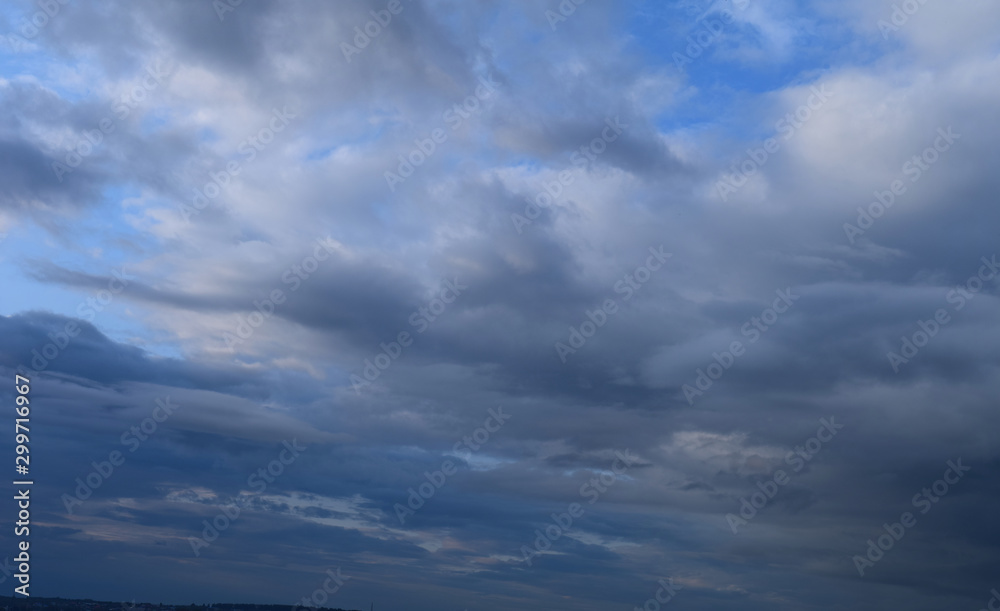 Heavy rain clouds. Photography, atmospheric phenomena, panoramic image of the autumn sky. Heavy rain clouds. Photography, atmospheric phenomena, panoramic image of the autumn sky.