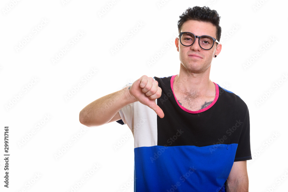 Studio shot of young handsome man isolated against white background Studio shot of young handsome man isolated against white background