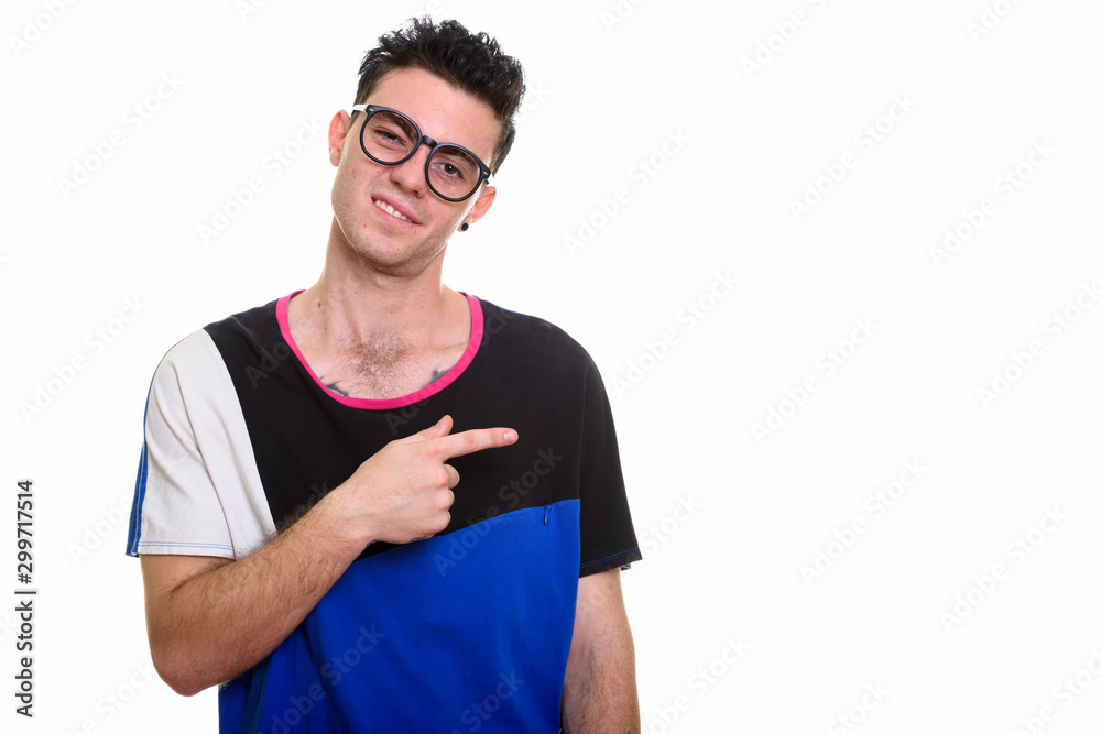 Studio shot of young handsome man isolated against white background