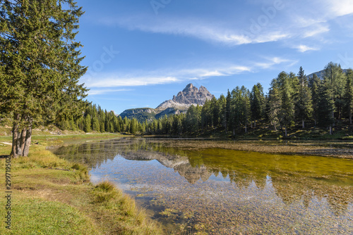 Tre Cime di Lavaredo, aka Drei Zinnen, reflection in water of Antorno Lake Dolomites, Italy.