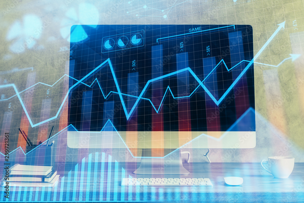 Financial graph colorful drawing and table with computer on background. Double exposure. Concept of international markets.