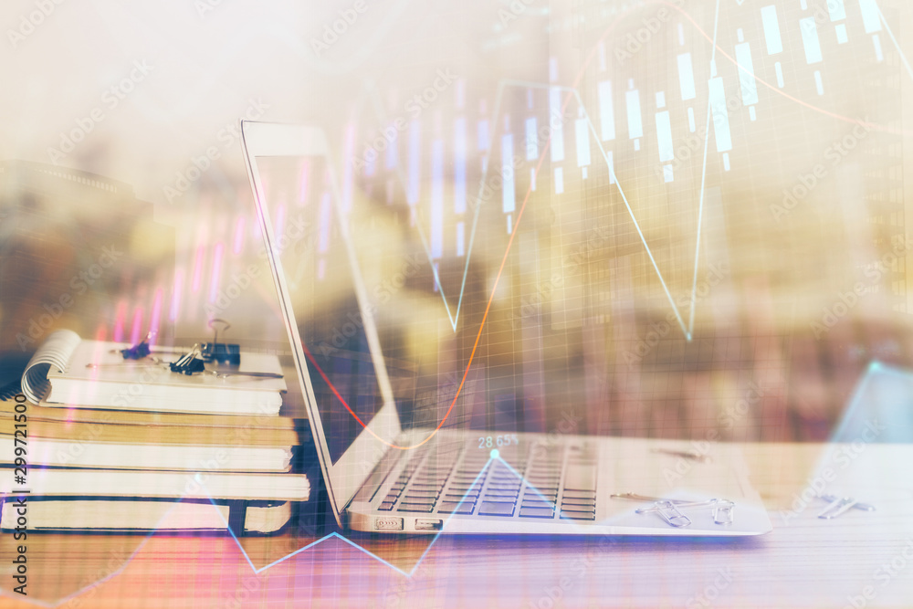 Stock market graph and table with computer background. Double exposure. Concept of financial analysis. Stock market graph and table with computer background. Double exposure. Concept of financial analysis.