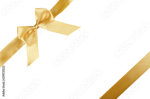 Christmas gold ribbon with bow isolated on white